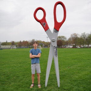FHK next to the World's Largest Scissors for FaZe Cizzorz